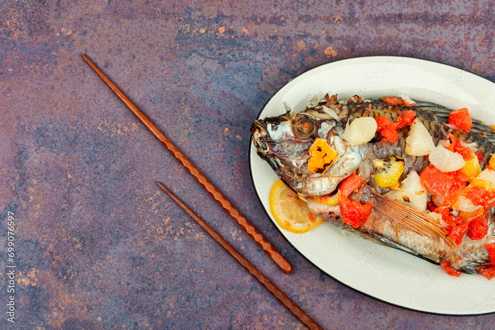 Roasted whole tilapia fish, asian food. Roasted whole tilapia fish, asian food.