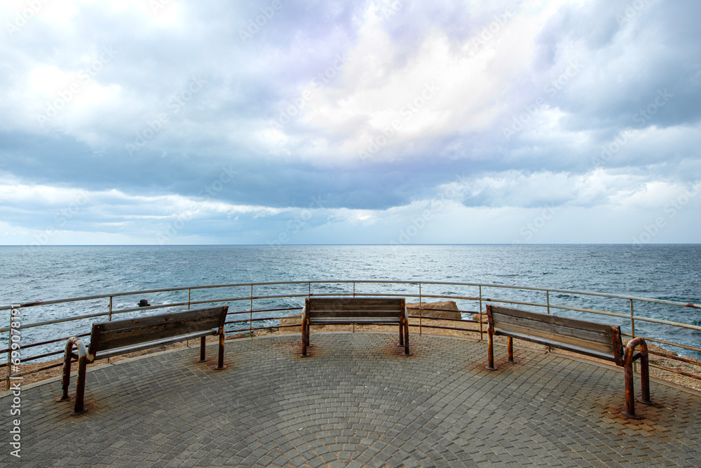 Empty bench by the sea. Cyprus.
A bench on the coast, by the sea.
Empty bench by the sea. Cyprus.
A bench on the coast, by the sea.