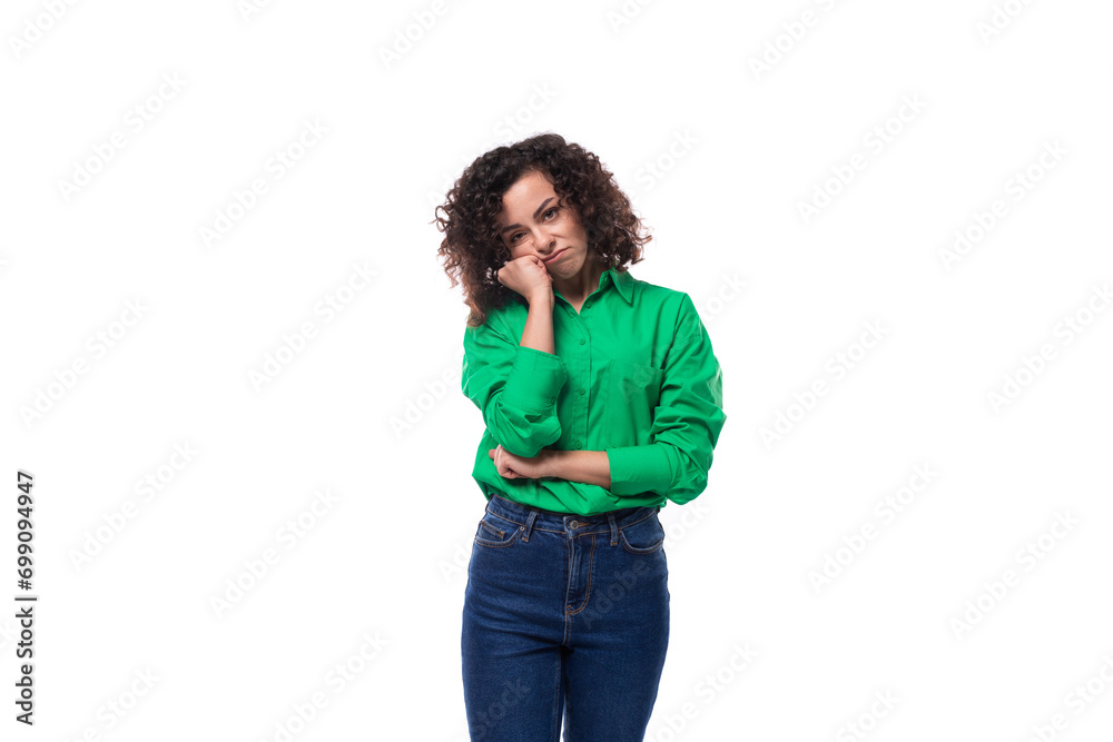 young brunette woman with stylish hair styling by curly method dressed in green blouse young brunette woman with stylish hair styling by curly method dressed in green blouse