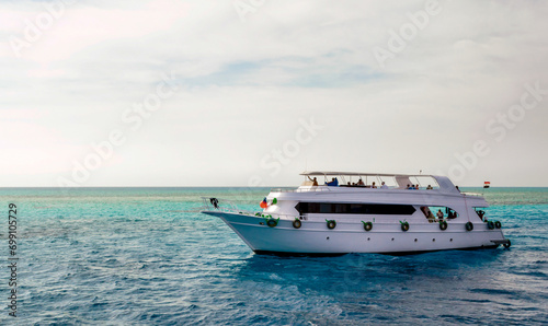 white cruise tourist boat in the Red Sea in Egypt photo