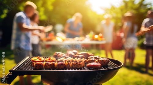 A photo of a family and friends having a picnic barbeque grill in the garden. having fun eating and enjoying time. sunny day in the summer. blur background 