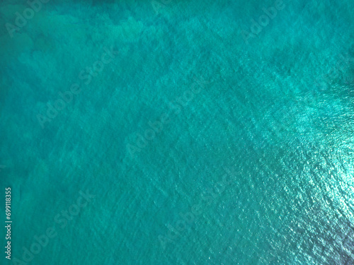 Aerial view of a crystal clear sea texture. photo