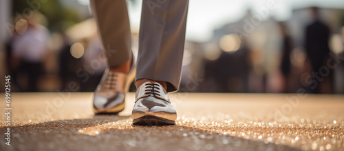 Male legs in classic patent leather shoes