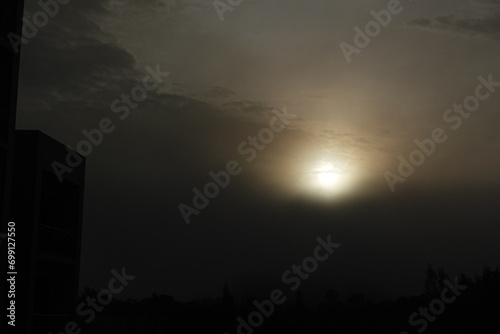 Scenic view of silhouette of building and sky at sunset.