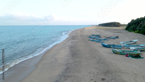 Aerial View of the Colorful Fishing Boats on the Baticaloa Beach, Sri Lanka. photo