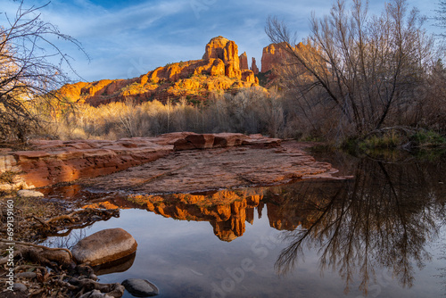 Cathedral Rock sunset at Oak Creek with reflection. Sedona, Arizona in winter photo