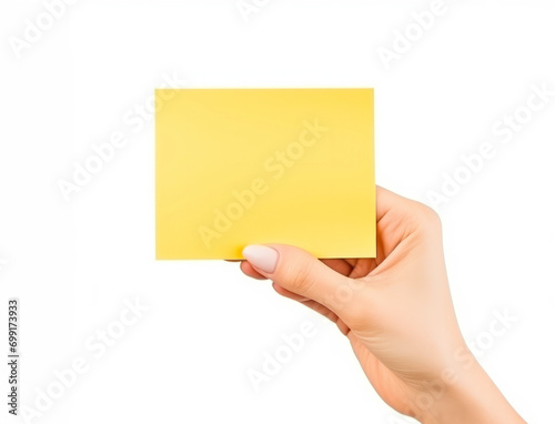 Woman hand holding yellow post-it notes mockup isolated on white background. Close up of hand showing square post it. Template with place for text.