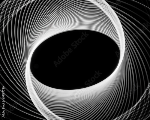PHOTO : Light painting photography of white spirographs on black background photo