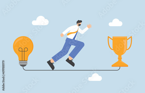 Creativity or innovative idea for business achievement, mindset for success concept, solution to victory or win competition concept, businessman running on path from light bulb to trophy.

