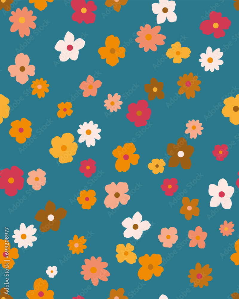 seamless colourful floral pattern, arranged in a random scatter on a blue background seamless colourful floral pattern, arranged in a random scatter on a blue background