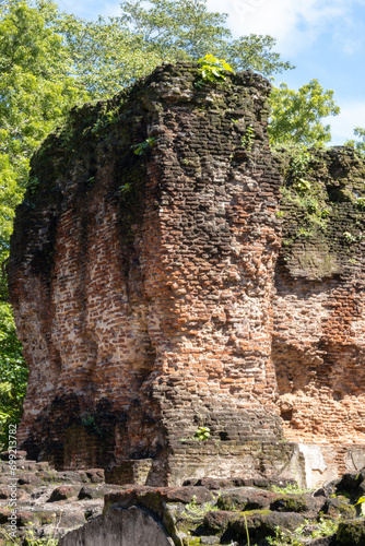 Ruins between the green in the ancient city of Polonaruwa, Sri Lanka photo