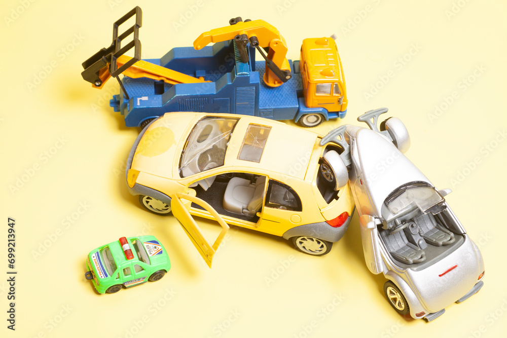Car crash accident on a yellow background. Insurance concept.