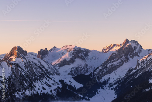 sunrise in the winter mountains