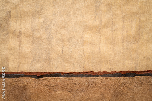 abstract landscape - background of buckskin amate bark paper handmade created in Mexico photo