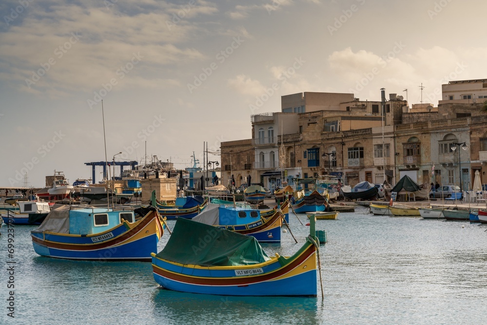 colorful fishing boats in the harbor of Marsaxlokk in southeastern Malta