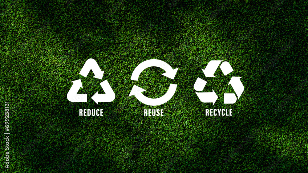 Reduce, reuse, recycle symbol with green grass background, ecological ...