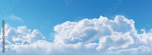 the blue sky and fluffy clouds with blue sky