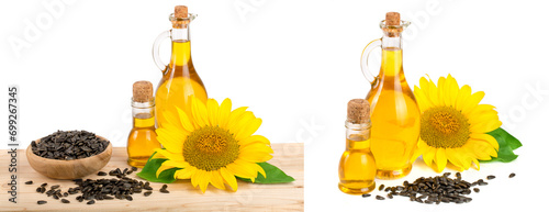 Sunflower oil, seeds and flower on wooden table with white background photo