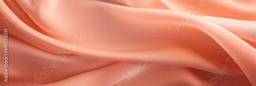 Peach textile with graceful folds