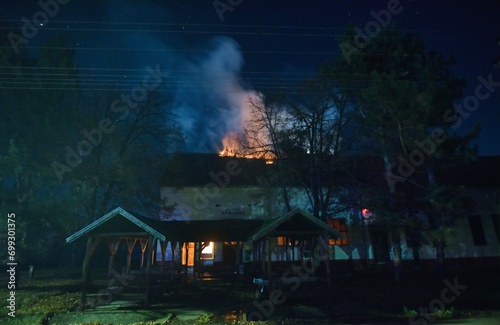 Fire inside the pub at night.