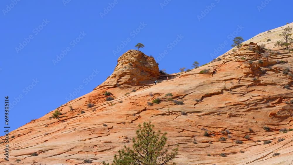 Establishing shot of mountains with red rocks in Zion Mount Carmel Highway, Zion National Park, Utah, North America. Day time. ProRes 422 HQ. Establishing shot of mountains with red rocks in Zion Mount Carmel Highway, Zion National Park, Utah, North America. Day time. ProRes 422 HQ.