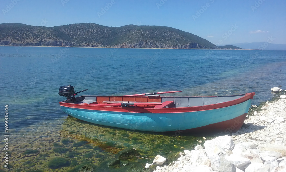A boat on the shore of Golem Grad Island, Prespa Lake, Macedonia