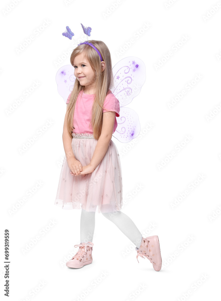 Cute little girl in fairy costume with violet wings on white background Cute little girl in fairy costume with violet wings on white background