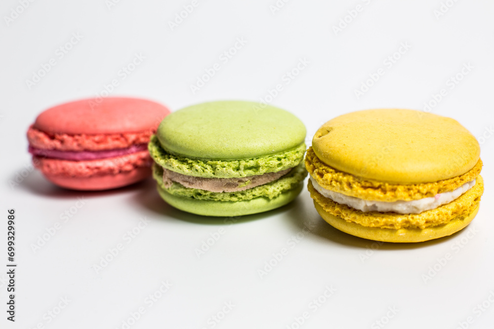 Macaron cookies on white background, delicious dessert Macaron cookies on white background, delicious dessert