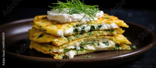 Stuffed chickpea flour pancake with cottage cheese.