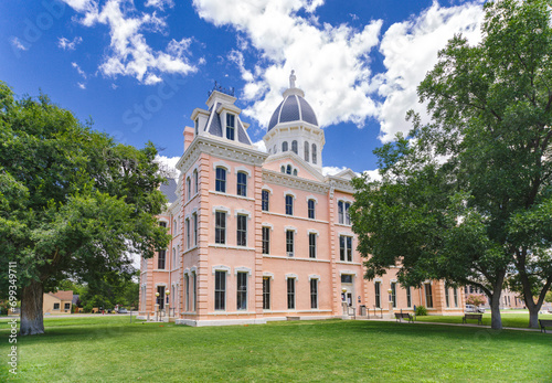 The pink colored Empire Style architecture Presidio County Courthouse in Marfa, Texas has been added the National Registry of Historic Places.