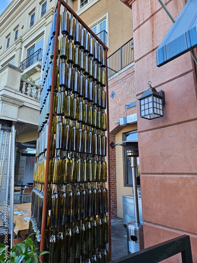 Wine bottles arranged vertically in a pattern as a work of art in Napa California