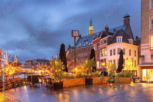 Bridge Visbrug and canal Oude Rijn in Christmas illumination, Dutch city of Leiden, Netherlands photo