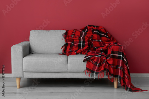 New soft blanket on sofa ne...