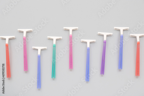 Safety razors on grey background