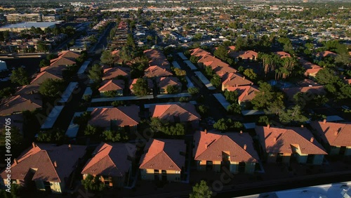 Drone Shot of Modern Residential Neighborhood in Las Vegas Nevada USA, Flying Above Homes on Golden Hour