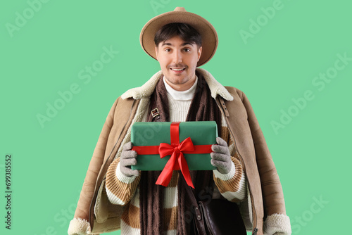 Young man in winter clothes...