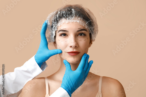 Young woman with marked fac...