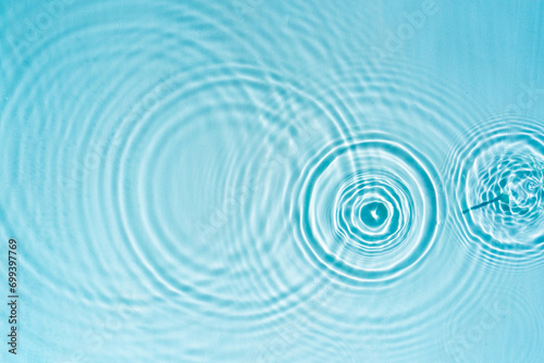 Beautiful pattern of circles of drops on a background of water Cosmetic moisturizing essence Abstract natural backdrop