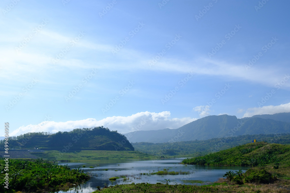 a portrait of a dried-up lake at the end of the village 