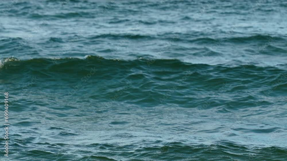 Closeup View Of Waves Motion In The Ocean Crashing To The Beach. Closeup View Of Waves Motion In The Ocean Crashing To The Beach.