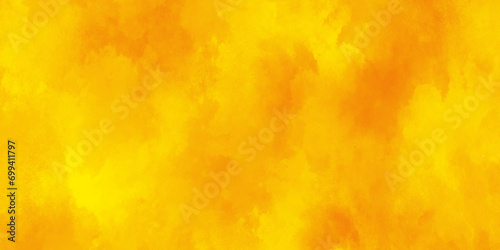 Blurry and fluffy orange or yellow background with smoke, bright and shinny yellow or orange watercolor shades grunge background with space,