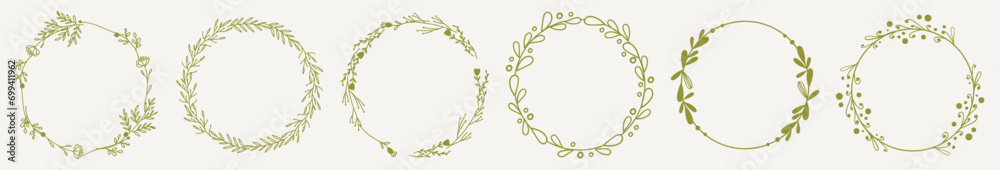 Vector set of golden hand drawn ink floral wreaths. A set of decorative circular floral frames.