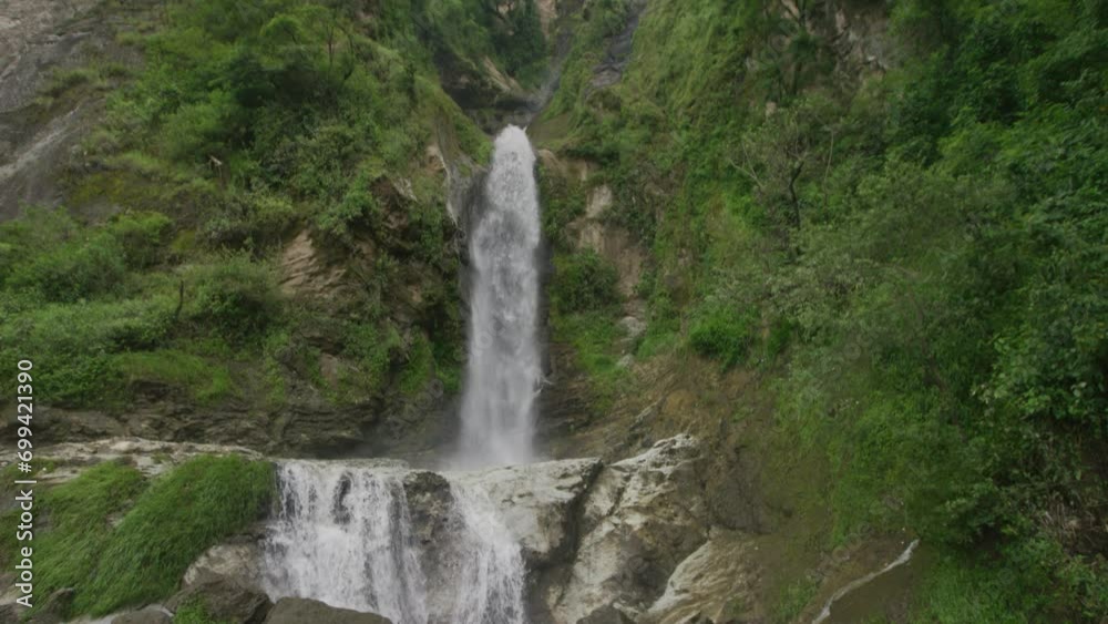 Small waterfall in Guatemala rainforest - tilt shot Small waterfall in Guatemala rainforest - tilt shot