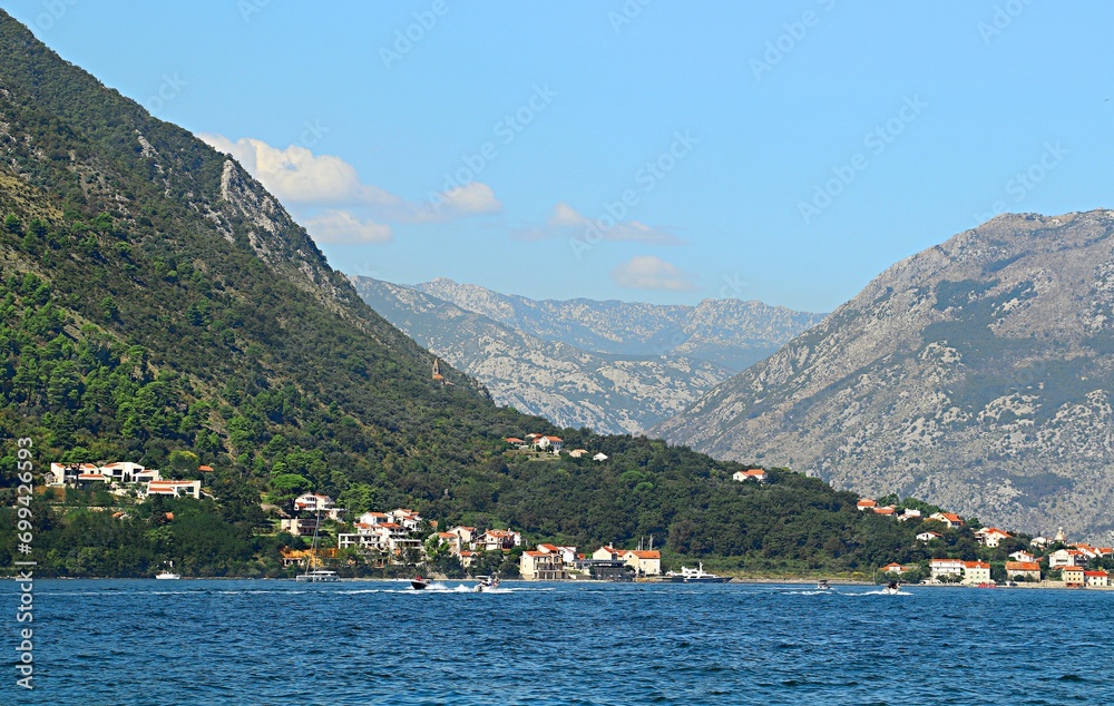 View of the resort villages, barks and the Bay of Kotor of the Adriatic Sea