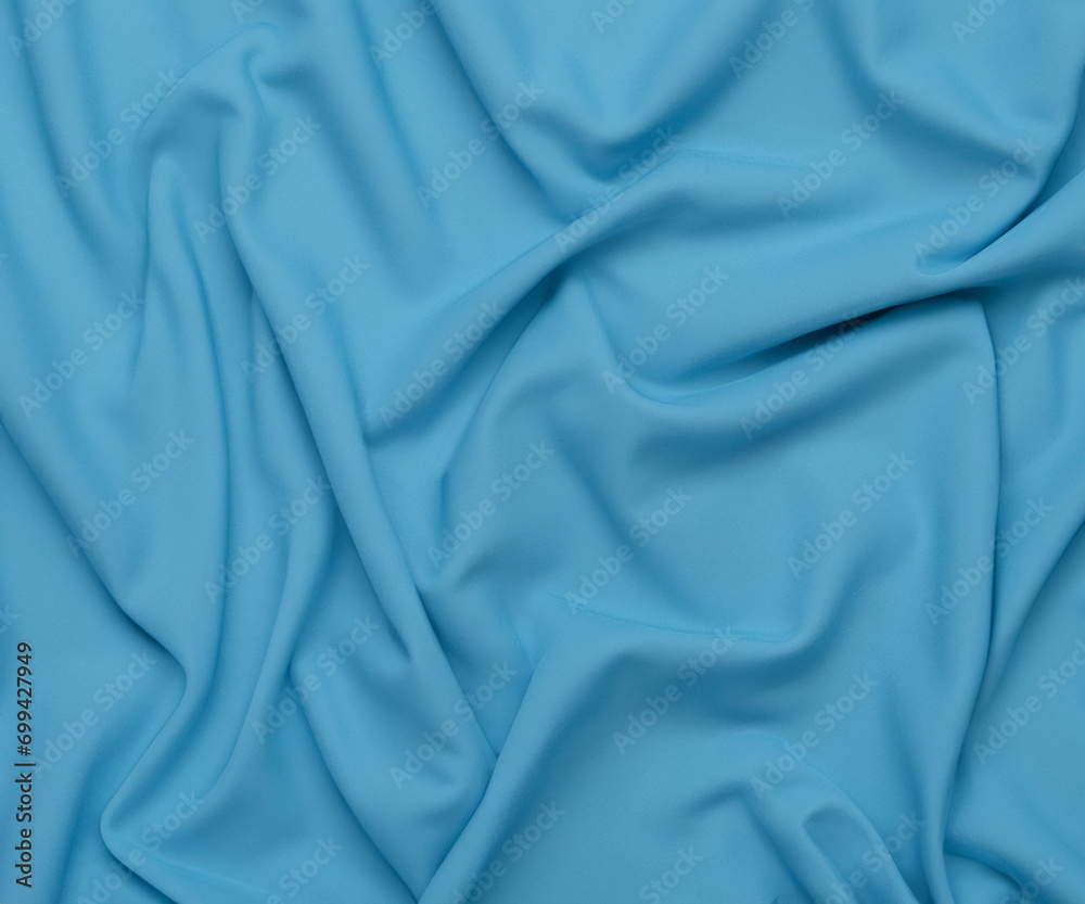 Texture of blue fabric top view. Pink pile fabric with pleats Texture of blue fabric top view. Pink pile fabric with pleats
