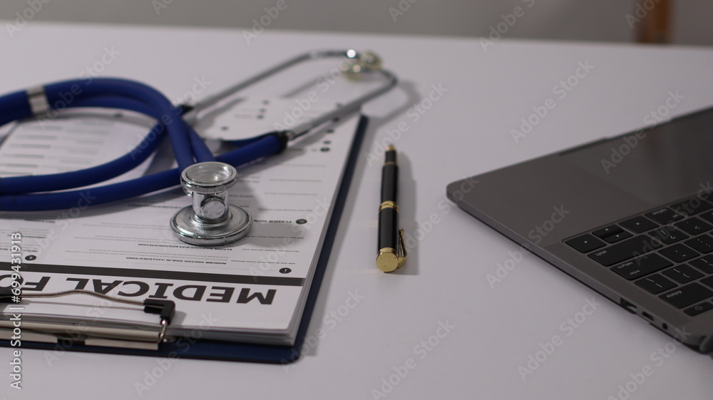 Initial AI illustration of a close-up of a female doctor's hand signing a medical document on a clipboard. and recommending certain medicines to patients on a laptop Initial AI illustration of a close-up of a female doctor's hand signing a medical document on a clipboard. and recommending certain medicines to patients on a laptop