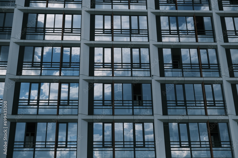 Office buildingfacade. Close up of a modern glass building.