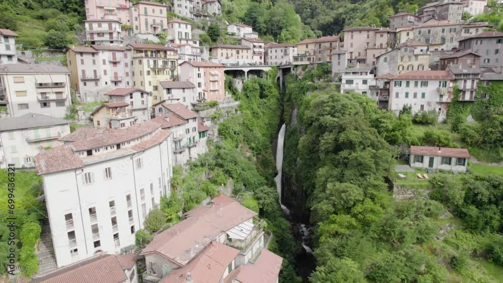 Beautiful Waterfall At Nesso Village By Lake Como - Aerial Drone SHot Pan Down Beautiful Waterfall At Nesso Village By Lake Como - Aerial Drone SHot Pan Down