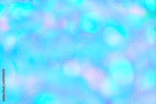 Blurred pastel neon blue mint pink holographic bokeh background texture. Abstract festive glittering Lo-fi retro design Smooth holographic iridescent colors . Festive optimistic pattern © Aleksandra Konoplya