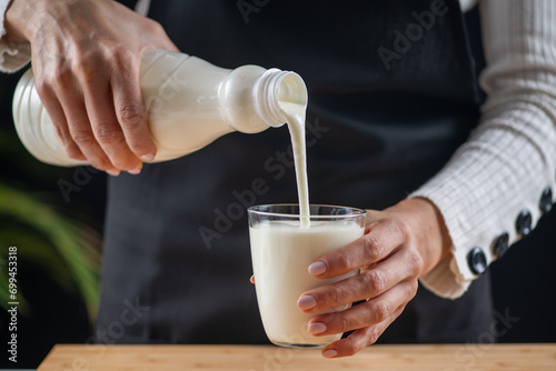 Goodness of kefir, a fermented dairy superfood drink, brimming with natural probiotics Lacto and Bifido Bacterium. photo